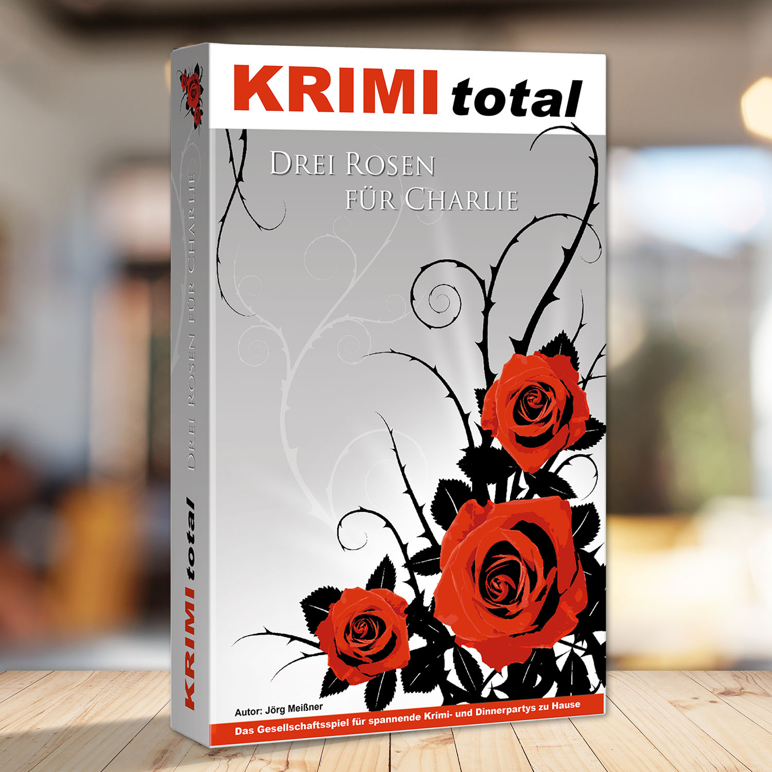 Abbildung eines Spielkartons des Krimidinner Spiels "KRIMI total - Drei Rosen für Charlie"